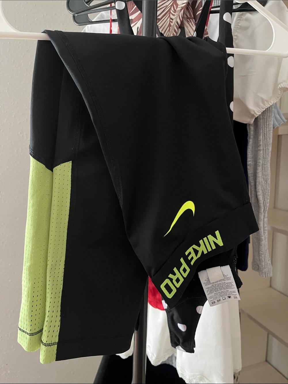 Nike Black Shorts with Neon Yellow-Green Accents